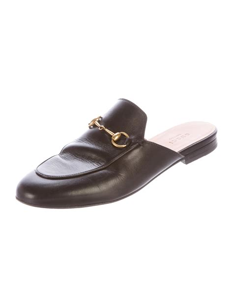 gucci loafer mules.